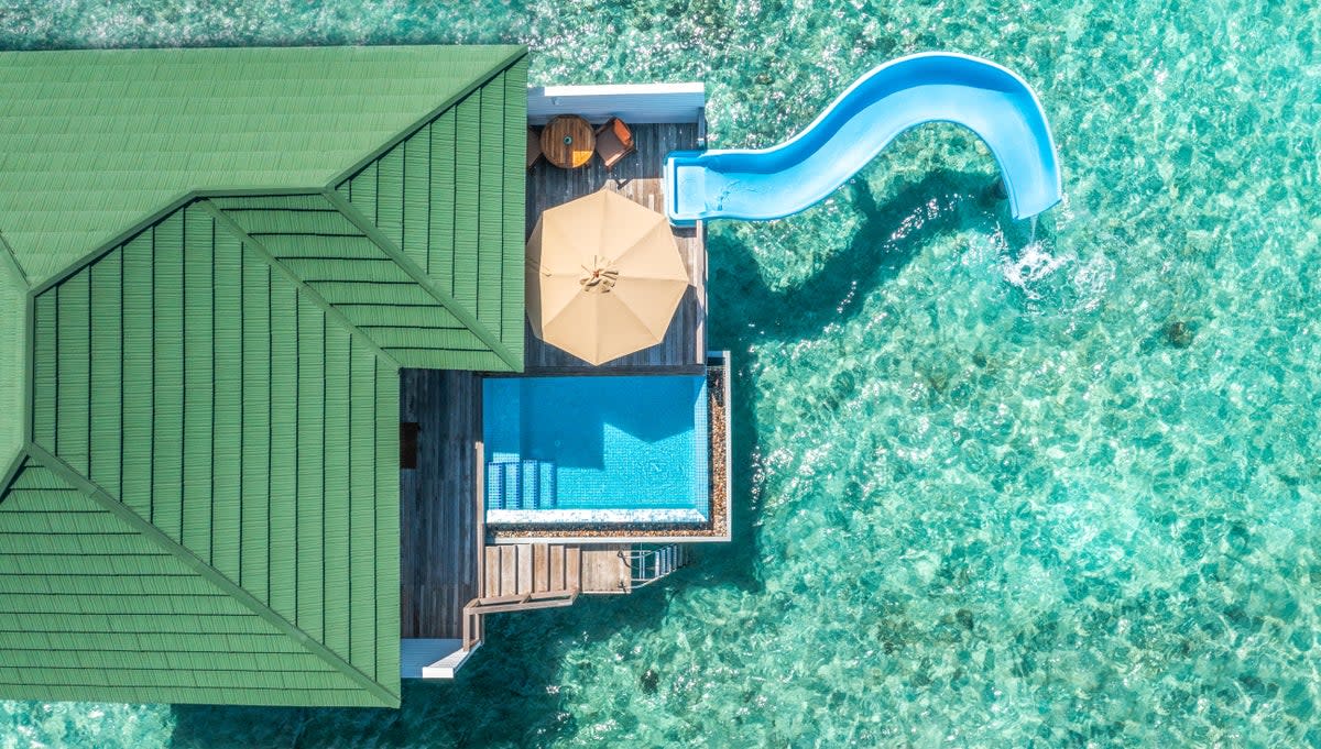 Slide out of your villas at Siyam World resort (Siyam World )