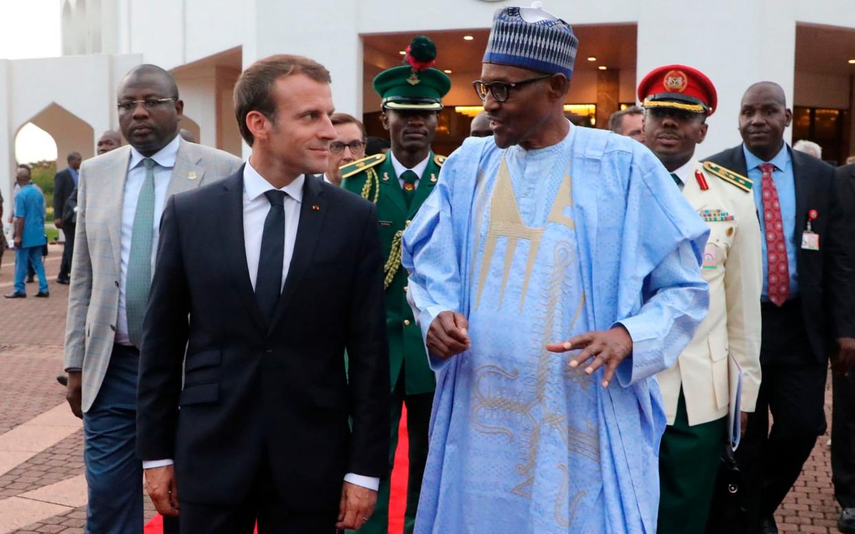 Nigeria's President Muhammadu Buhari and his French counterpart, Emmanuel Macron - AFP POOL