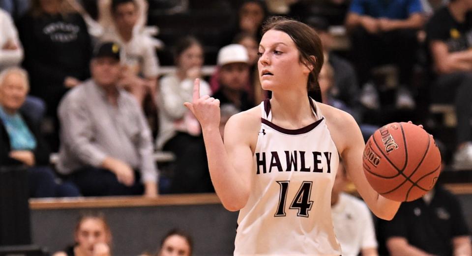 Hawley's Kinley Corley runs the offense against Cisco.  She scored a game-high 25 points in the loss to the Lady Loboes.