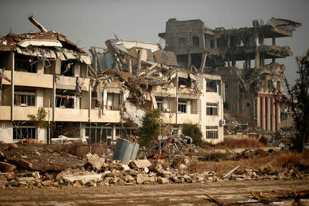 Buildings destroyed during previous clashes are seen as Iraqi forces battle with Islamic State militants in Mosul, Iraq January 23, 2017. REUTERS/Ahmed Jadallah