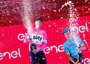 Cycling - Giro d'Italia, Rome, Italy - May 27, 2018 Team Sky's Chris Froome celebrates winning with third placed Astana Pro Team's Miguel Angel Lopez after the Giro d'Italia REUTERS/Alessandro Garofalo