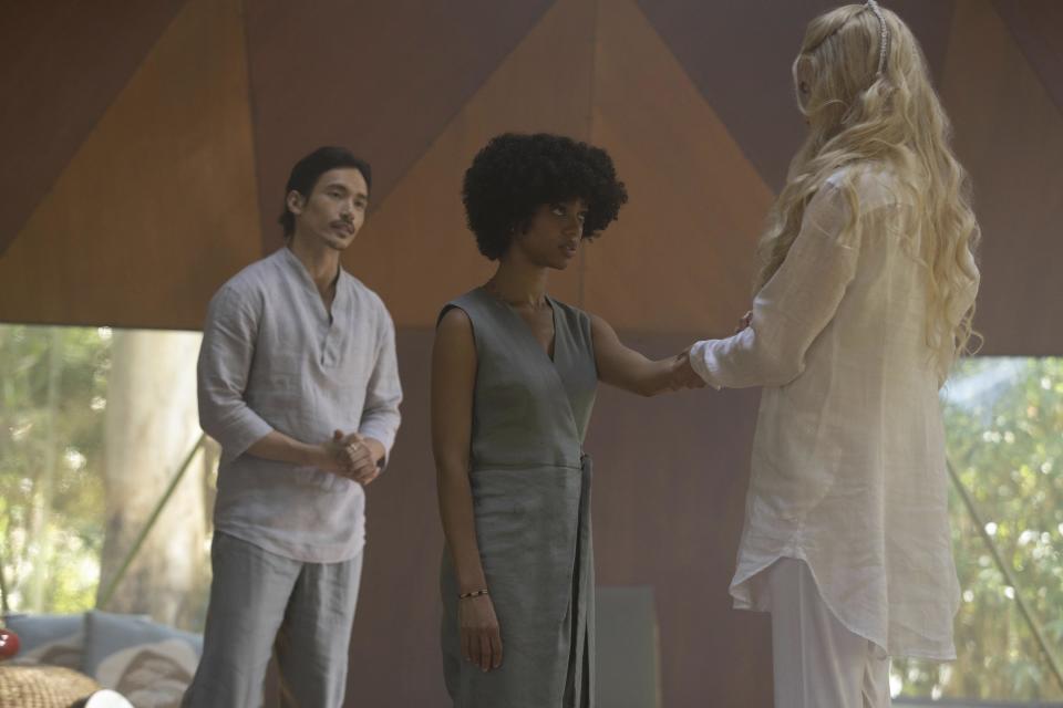 This image provided by Hulu shows Manny Jacinto, from left, Tiffany Boone and Nicole Kidman in a scene from "Nine Perfect Strangers." (Vince Valitutti/Hulu via AP)