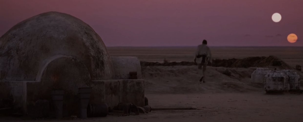 The Lars Homestead dome in the foreground as Luke Skywalker stares at Tatooine's binary Sunset. (Photo: Lucasfilm/YouTube)