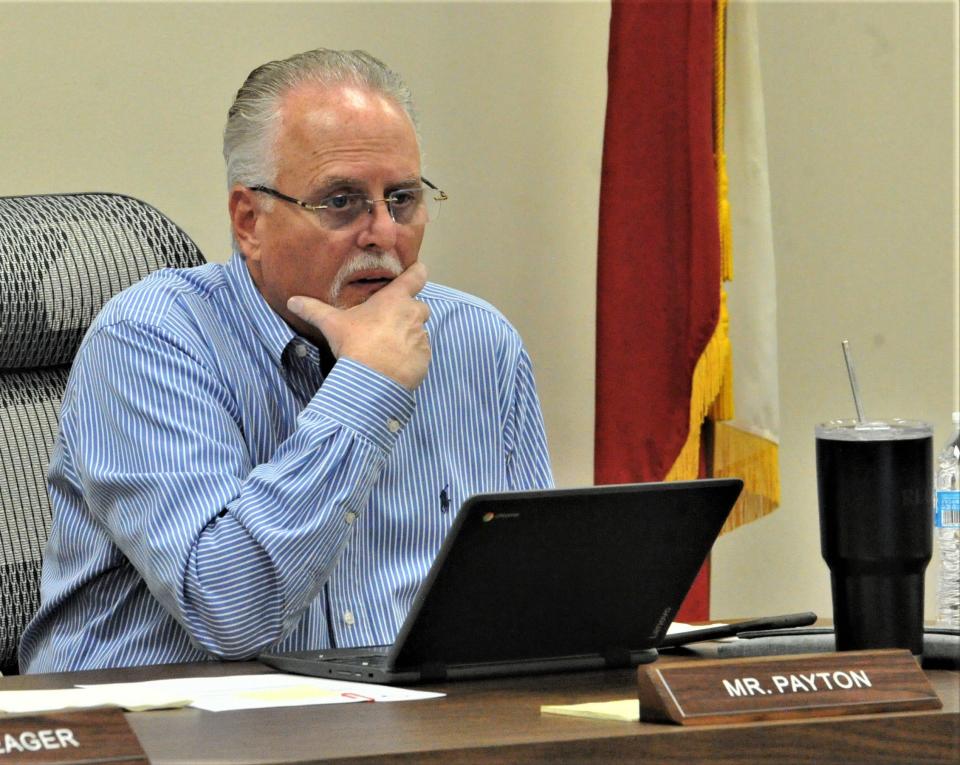 Wichita Falls ISD board member Bob Payton watches a power-point during a school board meeting at the WFISD Education Center on Friday, December 3, 2021.