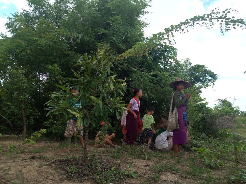 Displaced people flee violence at the town of Depayin in Myanmar's Sagaing region
