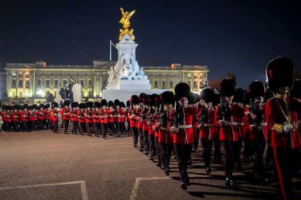 PHOTO: Members of the military march near Buckingham Palace in central London, May 2, 2023 during a rehearsal for the coronation of King Charles III which will take place at Westminster Abbey on May 6. (Vadim Ghirda/AP)