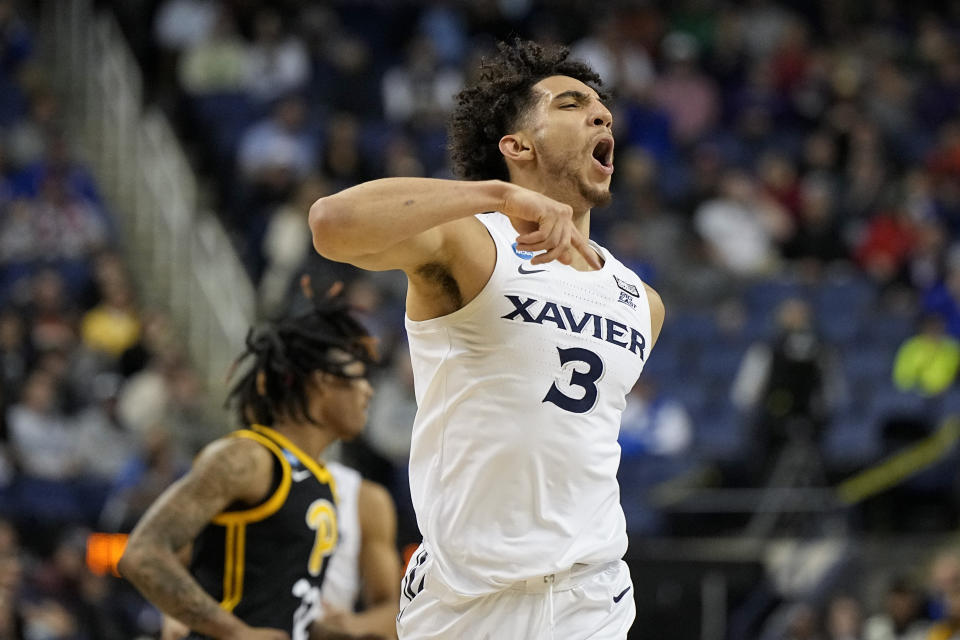 Xavier guard Colby Jones celebrates after scoring against Pittsburgh during the first half of a second-round college basketball game in the NCAA Tournament on Sunday, March 19, 2023, in Greensboro, N.C. (AP Photo/Chris Carlson)