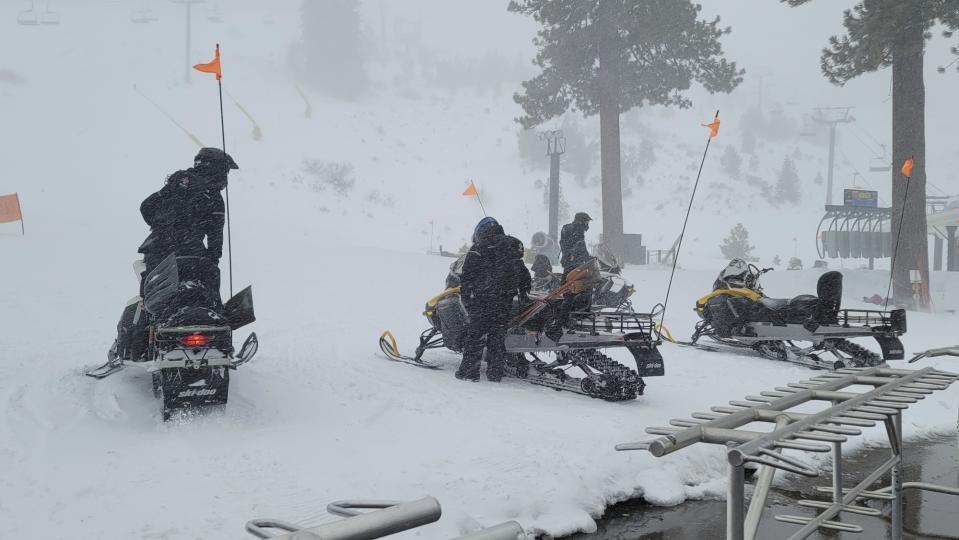 Rescue crews work at the scene of an avalanche at the Palisades Tahoe ski resort on Wednesday, Jan. 10, 2024, near Lake Tahoe, Calif. The avalanche roared through a section of expert trails at the ski resort as a major storm with snow and gusty winds moved into the region, authorities said. (Mark Sponsler via AP)