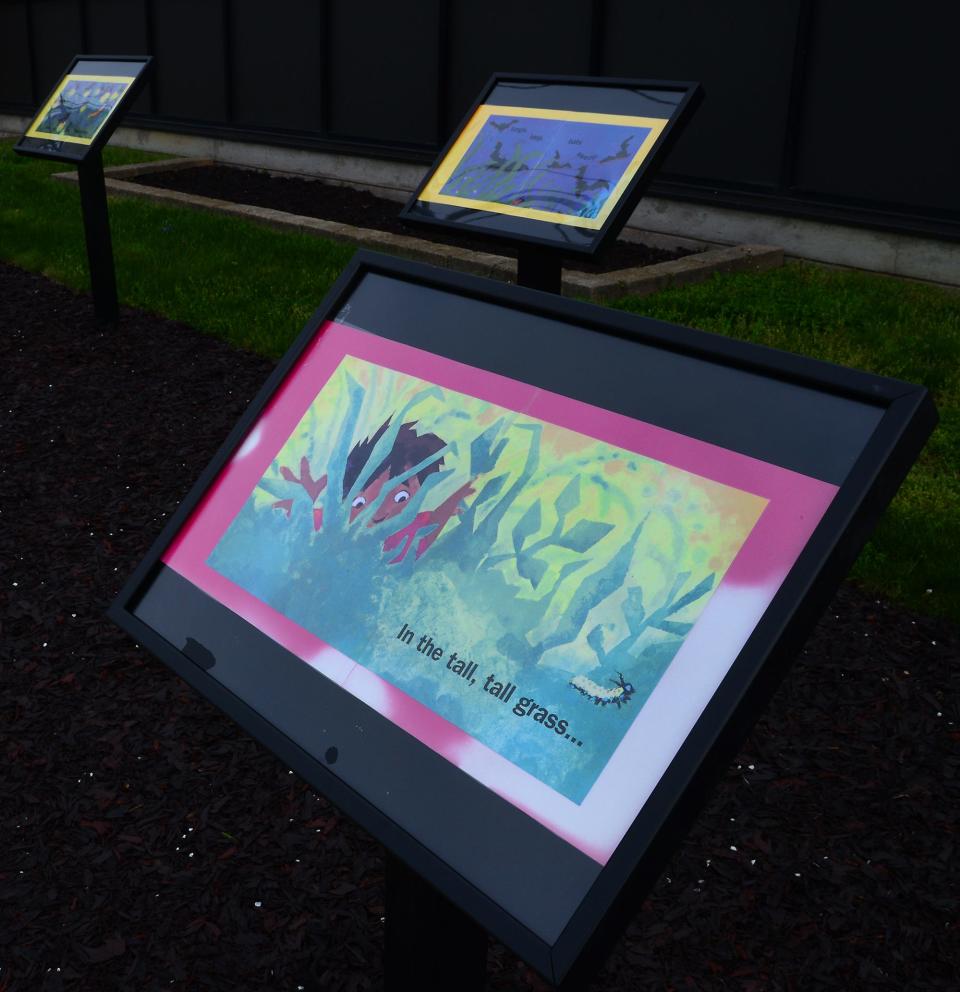Pages from Denise Fleming’s “In the Tall, Tall Grass” are featured at the StoryWalk located at Ellis Library & Reference Center.