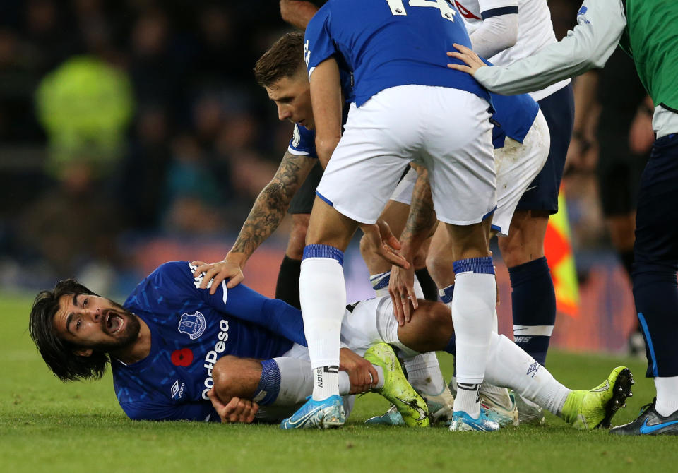 LIVERPOOL, ENGLAND - NOVEMBER 03: Andre Gomes of Everton reacts after being tackled by Son Heung-Min of Tottenham Hotspur during the Premier League match between Everton FC and Tottenham Hotspur at Goodison Park on November 03, 2019 in Liverpool, United Kingdom. (Photo by Jan Kruger/Getty Images)