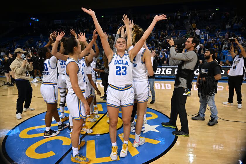 LOS ANGELES, CA - MARCH 18: UCLA Bruins forward Gabriela Jaquez (23) waves to the crowd after a win.