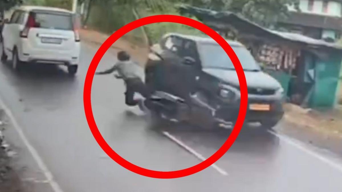 Motorcyclist leaps to safety at last second to avoid head-on collision