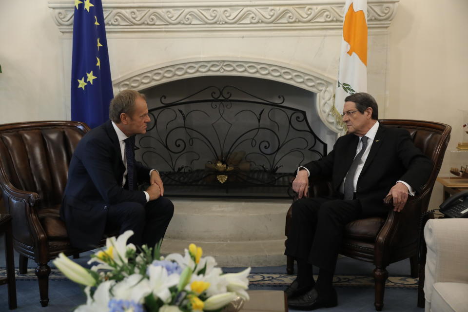 Cyprus' President Nicos Anastasiades, right, talks with European Council President Donald Tusk during their meeting at the presidential palace in divided capital Nicosia, Cyprus, Friday, Oct. 11, 2019. Tusk is in Cyprus for one-day visit. (Yiannis Kourtoglou/Pool Photo via AP)