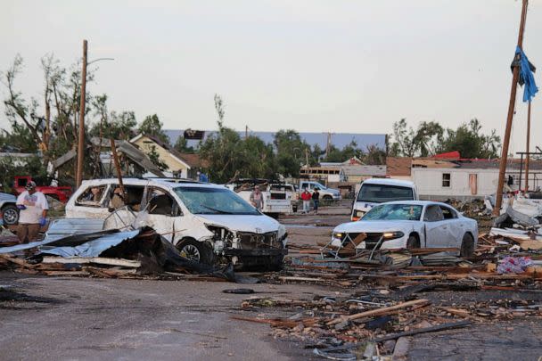 PHOTO: Debris and damaged vehicles cover a street after a tornado hit Perryton, Texas, June 15, 2023. (Alex Driggars/USA Today Network/via Reuters)