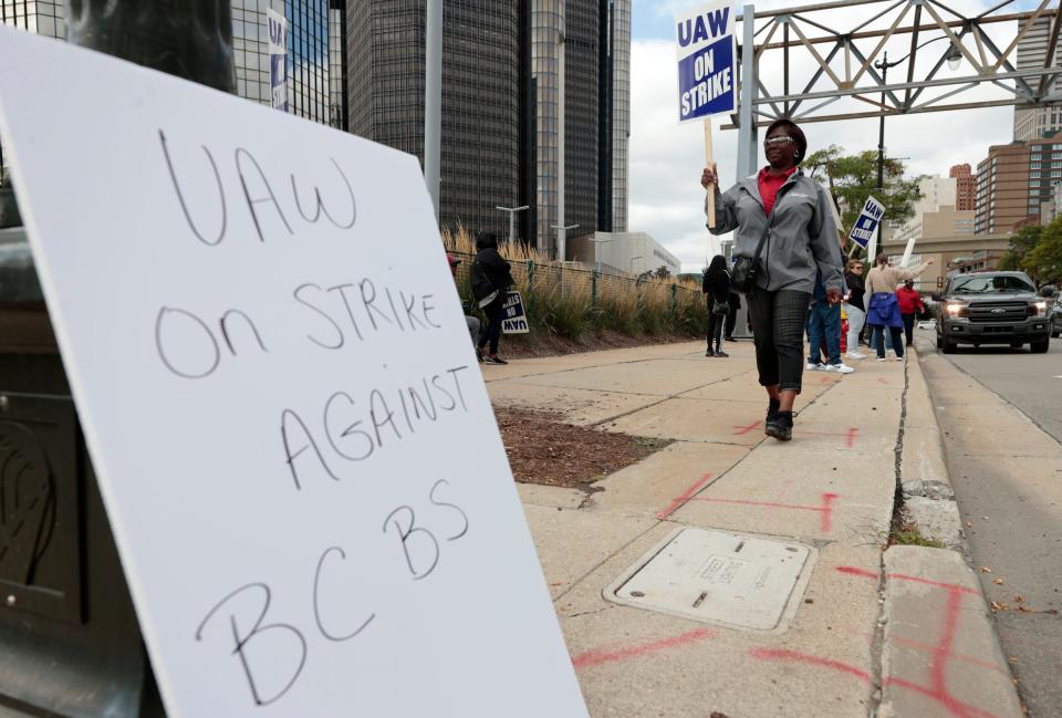 Margaret Mock, the UAW secretary-treasurer walks up and down Jefferson Avenue in front of the Blue Cross Blue Shield of Michigan office towers at the Renaissance Center in downtown Detroit on Wednesday, Sept. 13, 2023. Over 1,000 workers in Detroit's Region 1 and Region 1D in Grand Rapids and Lansing walked out this morning after their contract expired on August 31st and after the extensions they had approved ran out on the morning of September 13th.