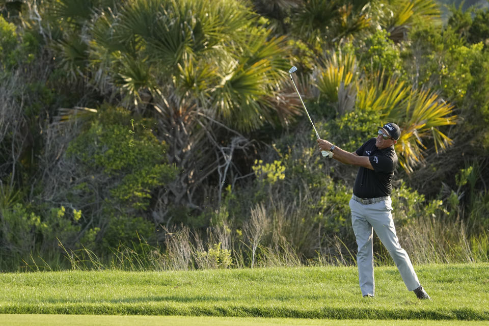 Phil Mickelson watches his second shot on the 10th hole during the second round of the PGA Championship golf tournament on the Ocean Course Friday, May 21, 2021, in Kiawah Island, S.C. (AP Photo/David J. Phillip)