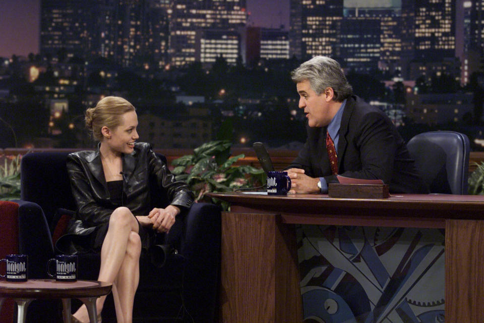 Close-up of Angie smiling on Jay Leno's show