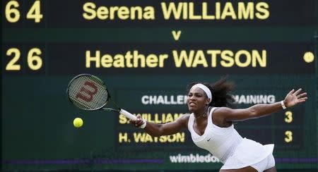 Serena Williams of the U.S.A. hits the ball during her match against Heather Watson of Britain at the Wimbledon Tennis Championships in London, July 3, 2015. REUTERS/Stefan Wermuth