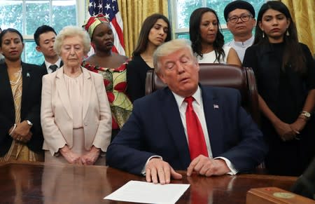 U.S. President Trump meets with victims of religious persecution at the White House in Washington