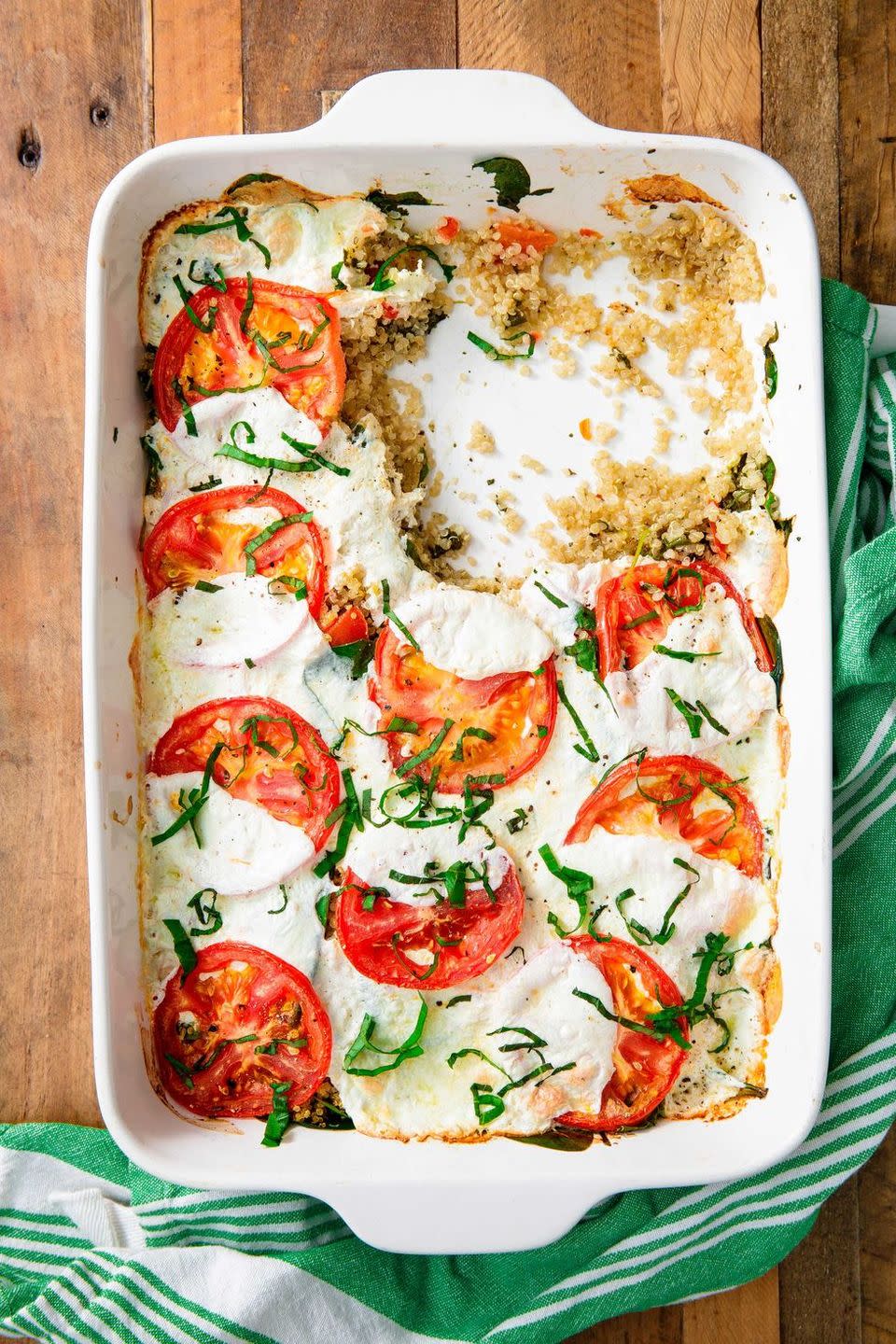 <p>This simple dish is perfect for summer nights when you're feeling uninspired for dinner—simply <a href="https://www.delish.com/cooking/recipe-ideas/a20136672/how-to-cook-quinoa/" rel="nofollow noopener" target="_blank" data-ylk="slk:cook quinoa;elm:context_link;itc:0;sec:content-canvas" class="link ">cook quinoa</a>, layer it with some low-moisture, fresh <a href="https://www.delish.com/cooking/g40048963/mozzarella-recipes/" rel="nofollow noopener" target="_blank" data-ylk="slk:mozzarella;elm:context_link;itc:0;sec:content-canvas" class="link ">mozzarella</a> and juicy <a href="https://www.delish.com/cooking/g1448/quick-easy-tomato-recipes/" rel="nofollow noopener" target="_blank" data-ylk="slk:tomatoes;elm:context_link;itc:0;sec:content-canvas" class="link ">tomatoes</a>, and bake!</p><p>Get the <strong><a href="https://www.delish.com/cooking/recipe-ideas/a22789171/caprese-quinoa-bake-recipe/" rel="nofollow noopener" target="_blank" data-ylk="slk:Caprese Quinoa Bake recipe;elm:context_link;itc:0;sec:content-canvas" class="link ">Caprese Quinoa Bake recipe</a></strong>.</p>