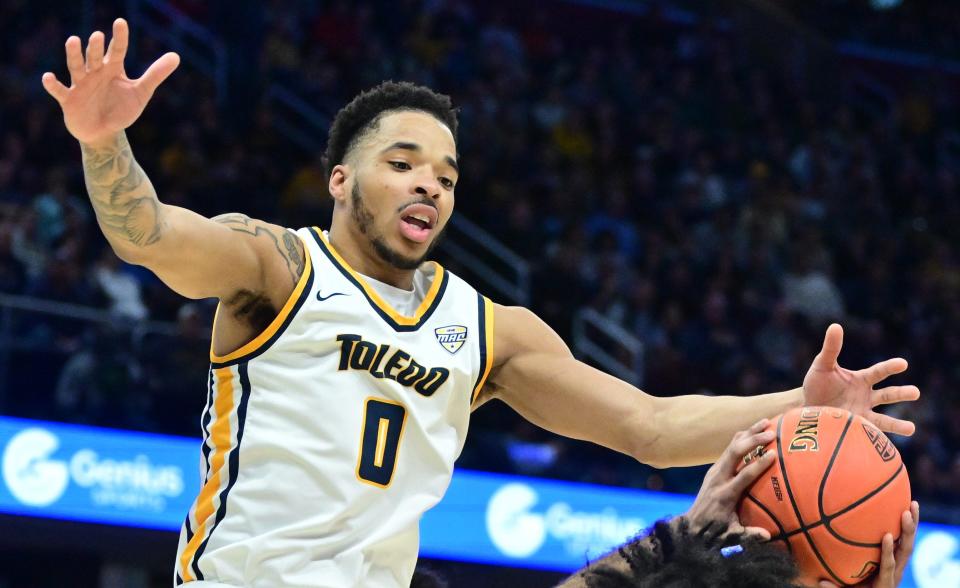 Toledo guard Ra'Heim Moss (0), in action in last year's MAC tournament, scored 12 points to help the Rockets beat the Akron Zips on Tuesday.