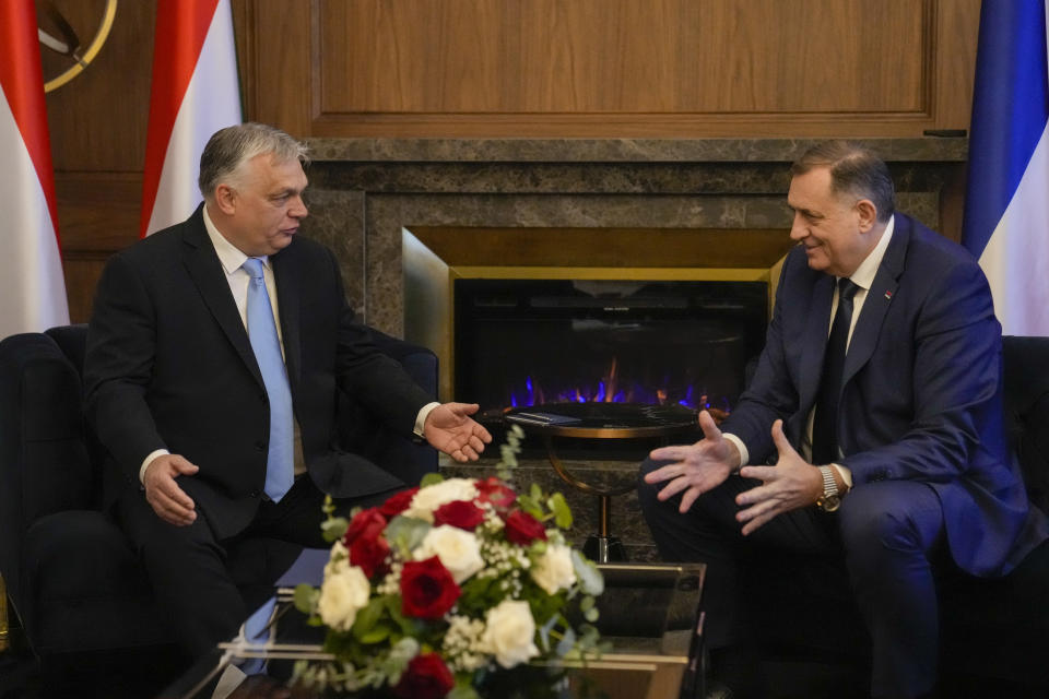 Bosnian Serb leader Milorad Dodik, right, talks to Hungary's Prime Minister Viktor Orban, during their meeting in Banja Luka, Bosnia, Friday, April 5, 2024. (AP Photo/Darko Bandic)