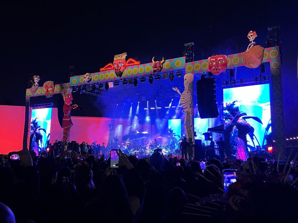 Colombian band Bomba Estéreo, best known for their song "Ojitos lindos" ("Pretty Eyes") with Bad Bunny, perform at the Día de Los Muertos celebration at the Hollywood Forever Cemetery in Los Angeles on Saturday, Oct. 28, 2023.