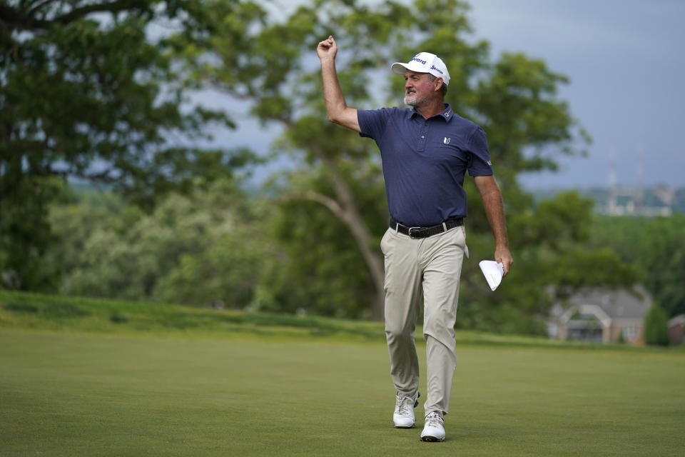 Jerry Kelly celebrates as he walks off the 18th green after winning the PGA Tour Champions Principal Charity Classic golf tournament, Sunday, June 5, 2022, in Des Moines, Iowa. (AP Photo/Charlie Neibergall)