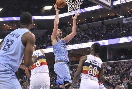 Jan 21, 2019; Memphis, TN, USA; Memphis Grizzlies center Marc Gasol (33) goes to the basket against New Orleans Pelicans center Jahlil Okafor (8) during the second half at FedExForum. The New Orleans Pelicans defeated the Memphis Grizzlies 105-85. Mandatory Credit: Justin Ford-USA TODAY Sports