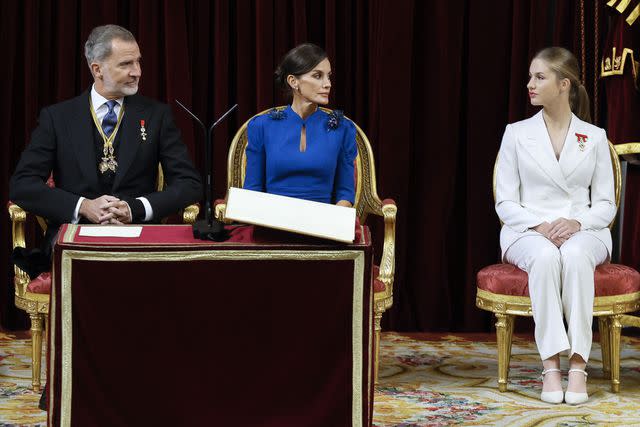 <p>ANDRES BALLESTEROS/POOL/AFP via Getty </p> The Spanish royals during Princess Leonor's constitution ceremony.