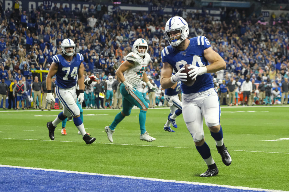 Indianapolis Colts tight end Jack Doyle (84) runs in for a touchdown after a catch against the Miami Dolphins during the second half of an NFL football game in Indianapolis, Sunday, Nov. 10, 2019. (AP Photo/AJ Mast)