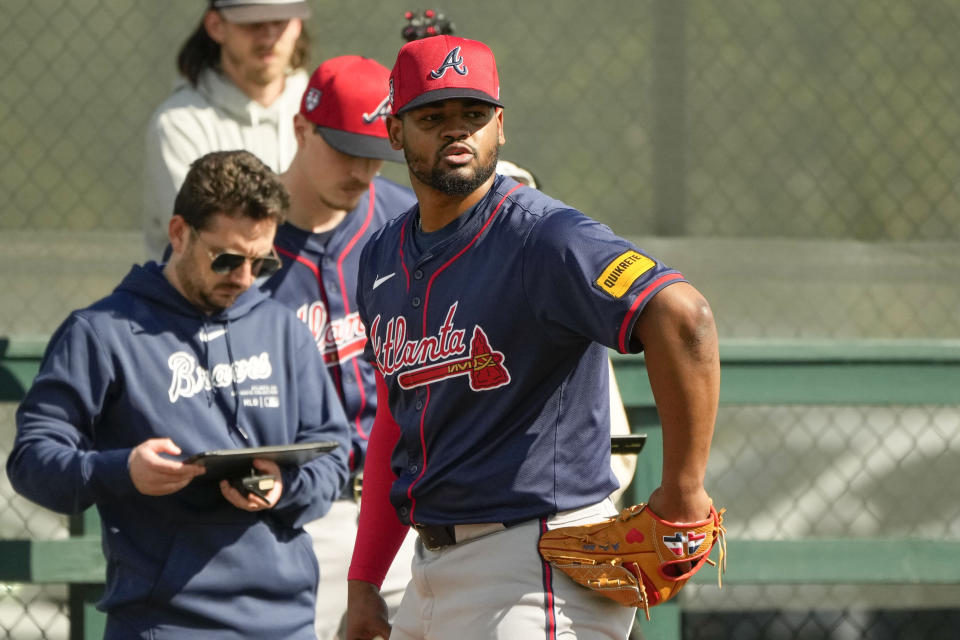 Atlanta Braves pitcher Reynaldo Lopez warms up during spring training in North Port, Fla., Monday, Feb. 19, 2024. (AP Photo/Gerald Herbert)