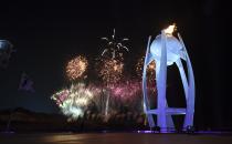 <p>Fireworks explode behind the Olympic cauldron at the start of the closing ceremony of the 2018 Winter Olympics in Pyeongchang, South Korea, Sunday, Feb. 25, 2018. (Christof Stache/Pool Photo via AP) </p>