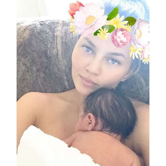 Flower child! Chrissy Teigen shared an Instagram snap with her newborn baby Luna on April 22, 2016. The stunning model added an extra cloudy filter with a flower crown to her snap captioning it "#nofilter," as a silly joke.