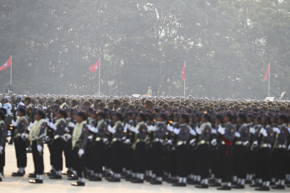 Senior Gen. Min Aung Hlaing, back right, head of the military council, inspects officers during a parade to commemorate Myanmar's 78th Armed Forces Day in Naypyitaw, Myanmar, Monday, March 27, 2023. (AP Photo/Aung Shine Oo)