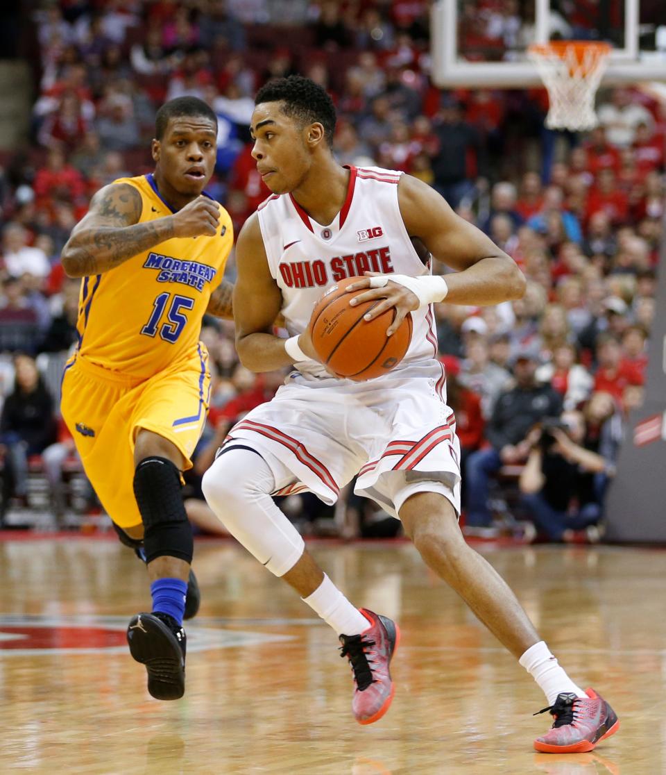 Ohio State Buckeyes guard D'Angelo Russell (0) is guarded by Morehead State Eagles guard Kareem Storey (15) during Saturday's NCAA Division I basketball game on December 13, 2014 at Value City Arena in Columbus. Ohio State won the game 87-69.  (Dispatch Photo by Barbara J. Perenic) 