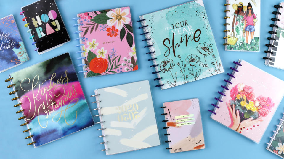 This photo provided by The Happy Planner shows a variety of planners the company has available in 2020. It's a digital and increasingly paperless age. But fans of paper planners remain as enthusiastic and steadfast as ever. (The Happy Planner via AP)