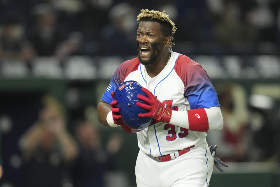 Yadir Drake of Cuba reacts while batting during the World Baseball Classic quarterfinal game between Cuba and Australia at the Tokyo Dome Tokyo, Wednesday, March 15, 2023. (AP Photo/Toru Hanai)