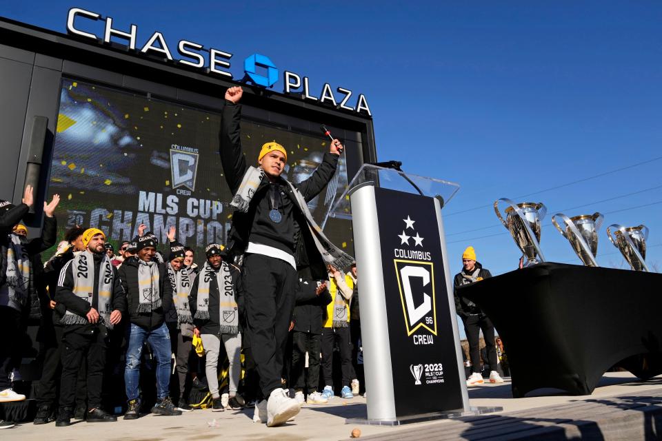 Crew forward Cucho Hernandez celebrates the 2023 MLS Cup victory in Chase Plaza outside of Lower.com Field.