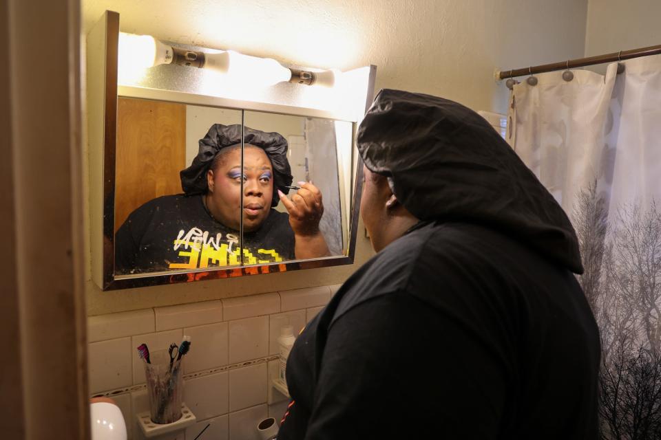 Diana Rae Ellis, 30, who goes by the drag show name Diana Rae, prepares to perform at a recent Drag Queen Story Time event in Louisville, Ky.