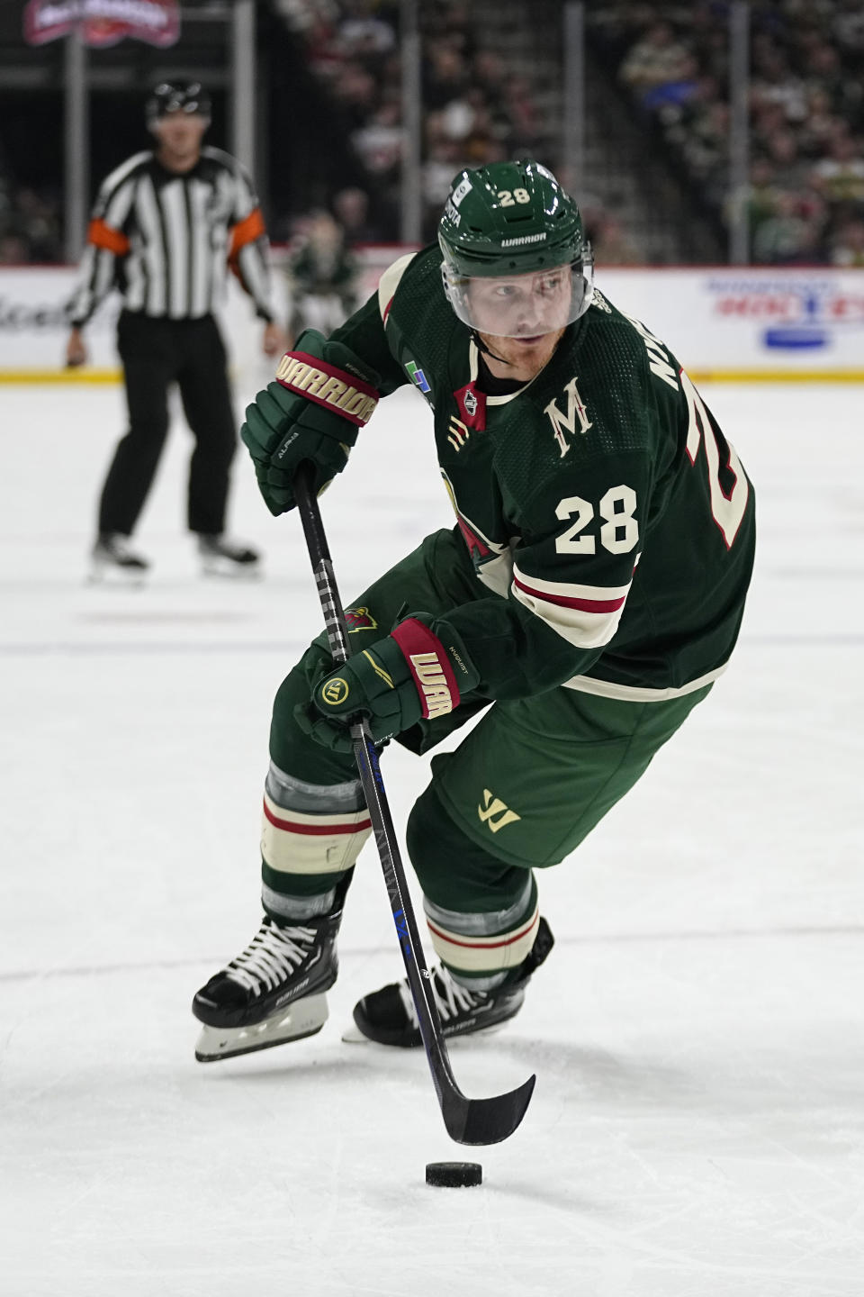 Minnesota Wild center Gustav Nyquist skates with the puck during the first period of the team's NHL hockey game against the St. Louis Blues, Saturday, April 8, 2023, in St. Paul, Minn. (AP Photo/Abbie Parr)