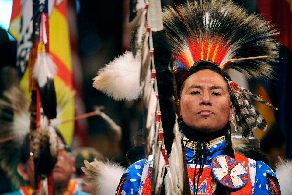 Nathan Chasing Horse of Rosebud, South Dakota, and a member of the Sioux Tribe, leads the Color guard at the beginning of the grand entry into the coliseum. The 37th annual Denver March Pow Wow finished up today, March 20th, 2011