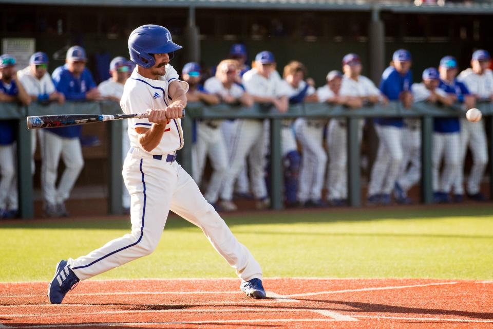 LCU's Carson Ogilvie (2) hits the ball against West Texas A&M in game one of their baseball series, Friday, May 5, 2023, at Hays Field.