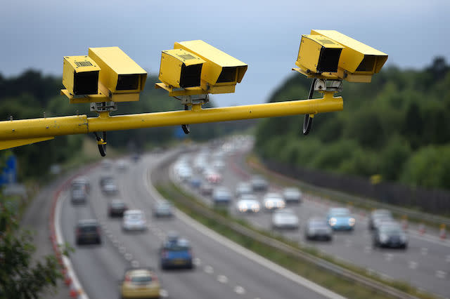 General view of three SPECS Average Speed cameras in position on the M3 motorway in Hampshire