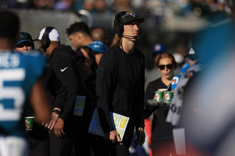 Jacksonville Jaguars quarterback Trevor Lawrence (16) looks on from the sideline during the fourth quarter of a regular season NFL football matchup Sunday, Dec. 31, 2023 at EverBank Stadium in Jacksonville, Fla. The Jacksonville Jaguars blanked the Carolina Panthers 26-0. [Corey Perrine/Florida Times-Union]