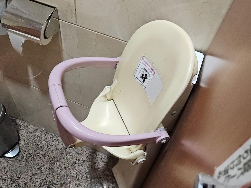 Bathroom booster seat in Japanese bathroom