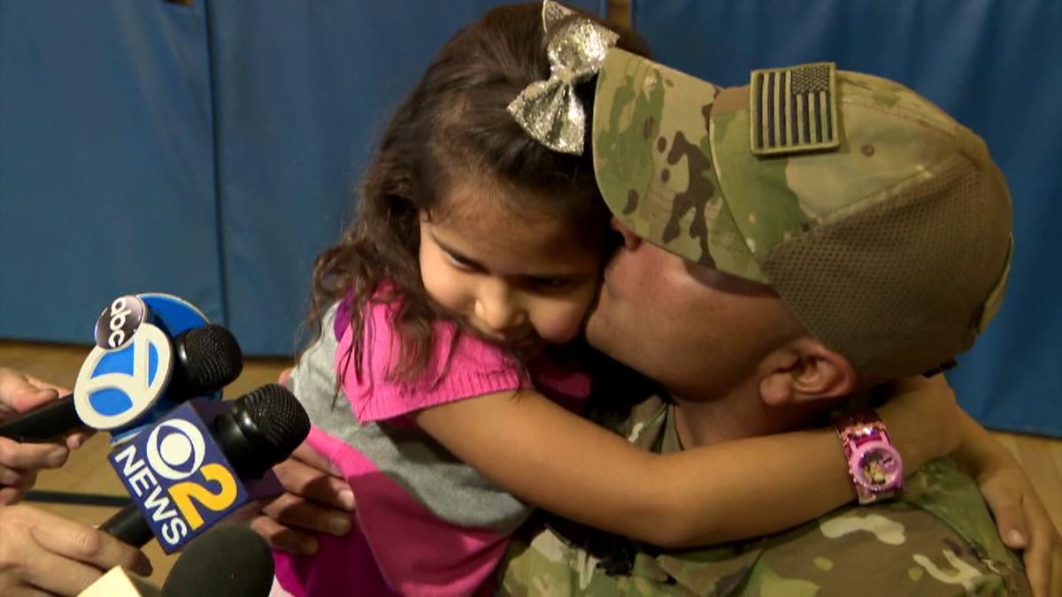 Military Dad Surprises Daughter During Assembly At School