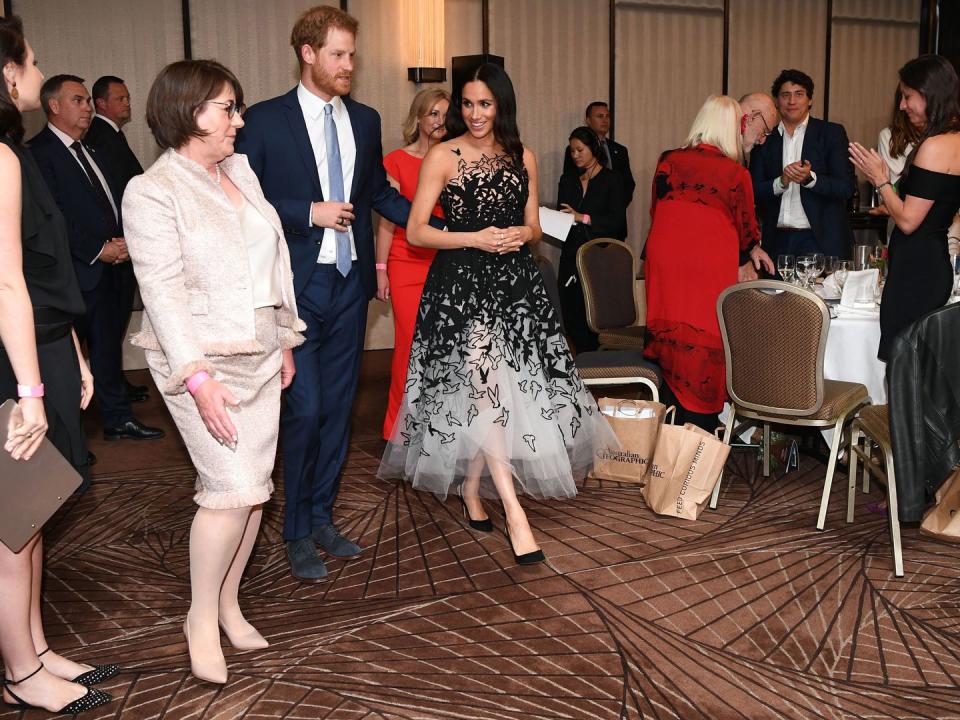 <p><strong>26 October</strong> For the occasion, <a rel="nofollow noopener" href="https://www.harpersbazaar.com/uk/fashion/fashion-news/a24258172/meghan-oscar-de-la-renta-dress-sydney/" target="_blank" data-ylk="slk:Meghan wore a tulle Oscar de la Renta ballgown and Tabitha Simmons shoes;elm:context_link;itc:0;sec:content-canvas" class="link ">Meghan wore a tulle Oscar de la Renta ballgown and Tabitha Simmons shoes</a>.</p>