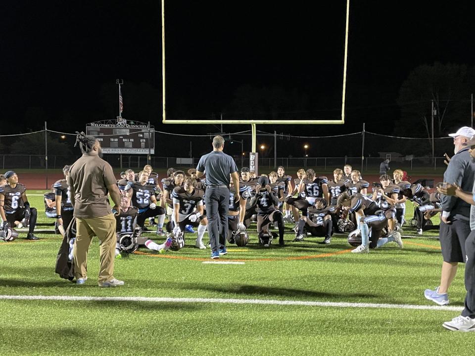 Coach Tim Rose talks to his East Rochester/Gananda football team after its 50-36 win over Lyons/Sodus in the season opener Saturday, Sept. 2, 2023 at Don Quinn Field.