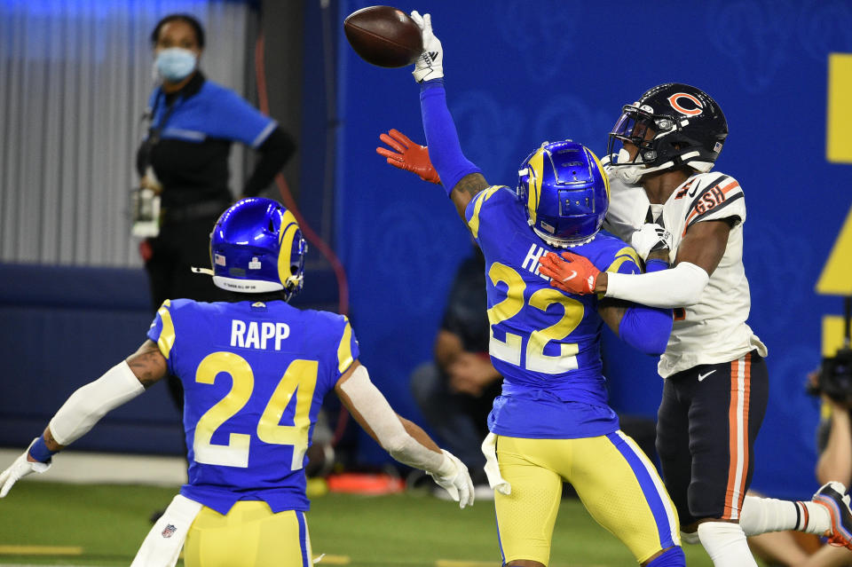 Los Angeles Rams cornerback Troy Hill (22) tips a pass in the end zone intended for Chicago Bears wide receiver Darnell Mooney, right, during the second half of an NFL football game Monday, Oct. 26, 2020, in Inglewood, Calif. The tipped pass was intercepted by Rams safety Taylor Rapp (24) for a touchback. (AP Photo/Kelvin Kuo)